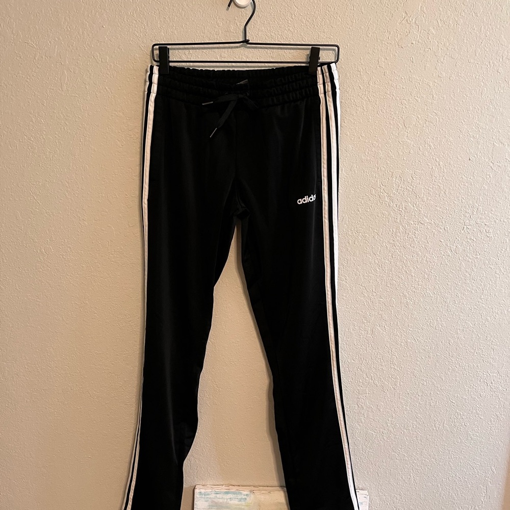 Adidas women’s Black Joggers with White Stripes
